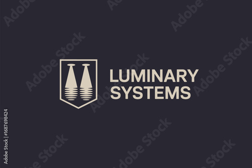 Luminary systems logo featuring two light beams in a shield on a dark background with text beside it