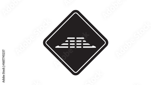 Uneven road ahead Drive carefully over bumpy road surface