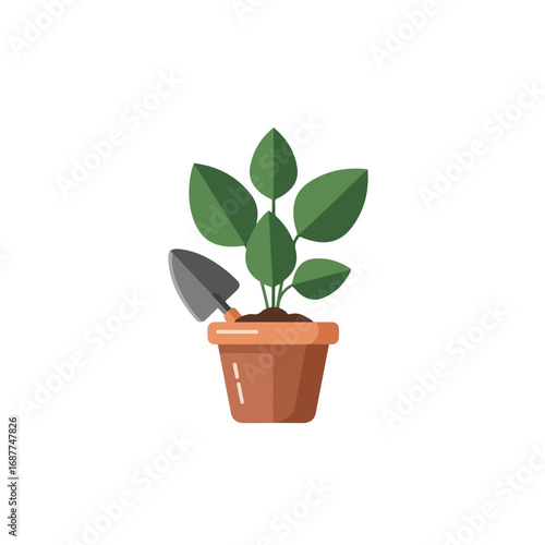 Home gardening plants sprouting in pot with small garden trowel, ready for garden work. Home gardening plants in decorative flowerpot ready for nurturing.