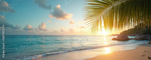 Tropical beach at sunset with palm fronds framing tranquil ocean water. Gentle waves wash ashore on sandy coast. Golden hour light creates serene, peaceful atmosphere for vacation or relaxation.