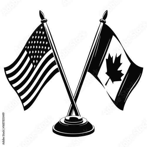 Crossed american and canadian flags on a tabletop stand