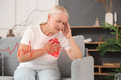 Mature woman having heart a...