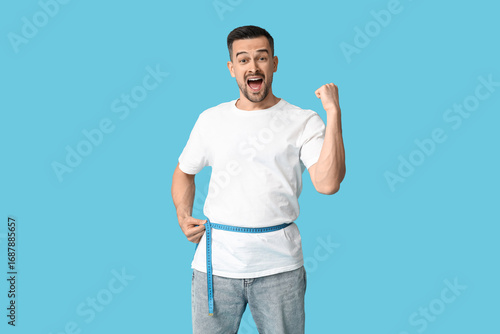 Handsome sporty happy man m...