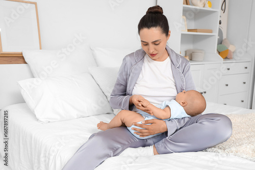 Happy young mother with her...