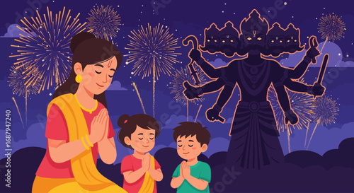 A woman and two children are praying with hands together in front of a silhouette of Ravana with fireworks in the background, celebrating Diwali.
