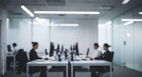 Modern office background with blurred desks, computers, and business people silhouettes, professional corporate look, soft light, clean style