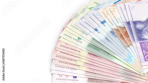 Fan of swedish krona banknotes isolated on a white background