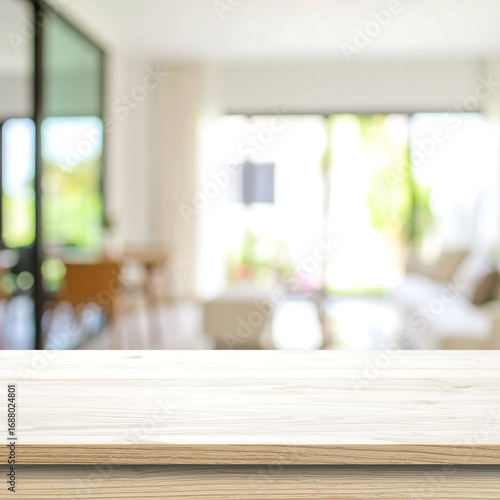Blurry interior scene, light wood table top