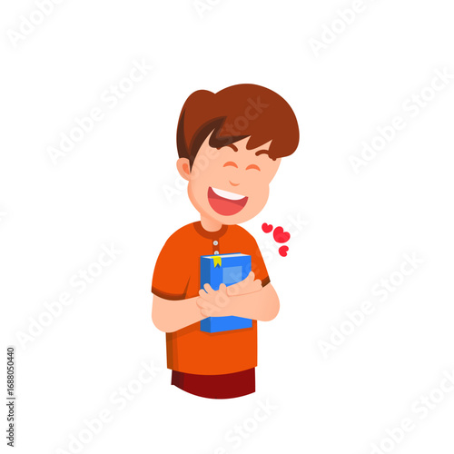 A smiling boy hugs a book tightly