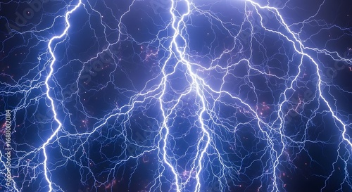 Intricate blue lightning strikes across dark night sky.