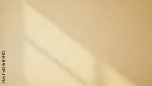 Neutral Beige Wall Texture with Sunlight Shadow Overlay for Mockups