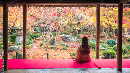woman in Kimono at enkoji temple view fall leaf garden, Kyoto