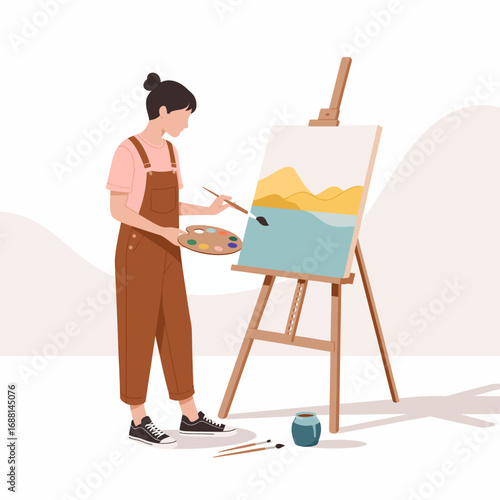 A dedicated female artist in overalls focuses on creating a beautiful landscape painting, skillfully blending colors and capturing the essence of nature's beauty.