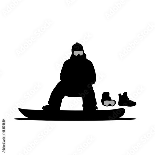 Dynamic snowboarder in silhouette poised for action on the slopes with goggles and boots nearby, capturing winter sports thrill