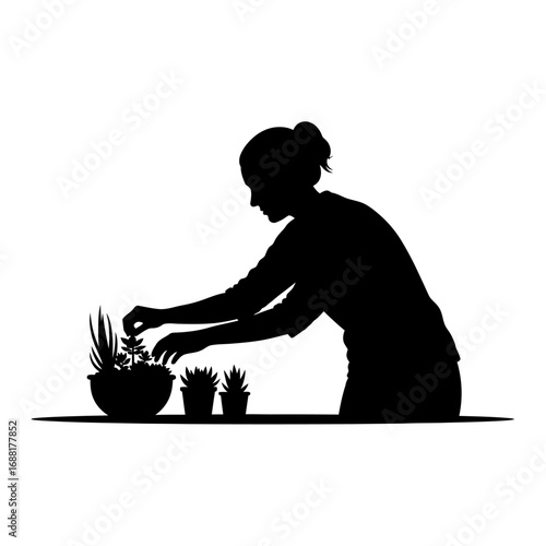 Silhouette of woman carefully tending to potted plants, creating a serene moment of nature connection and mindful growth indoors.