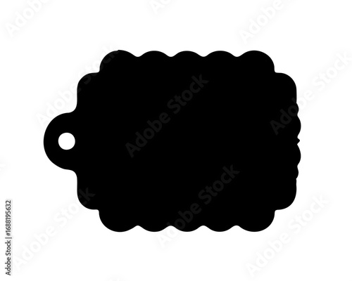 A whimsical black tag with scalloped edges ready to be adorned