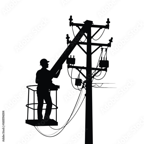 Electrician in bucket truck working on power lines