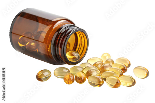 Brown glass pill bottle with golden softgel capsules spilled isolated on white background
