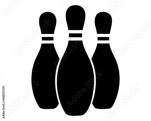 Three black bowling pins ready to be knocked down in a strike