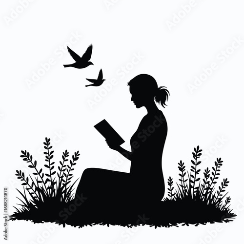Silhouette of woman reading book outdoors with birds flying