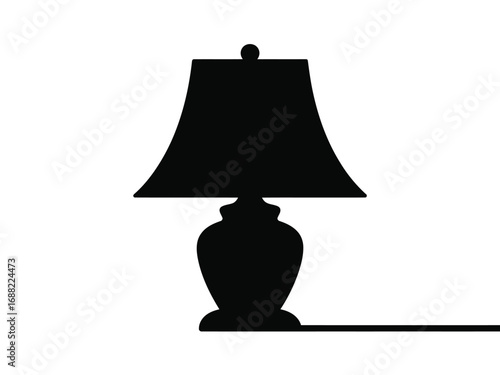 Elegant silhouette of a table lamp on a surface