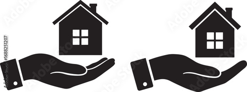 Two hands holding houses silhouette