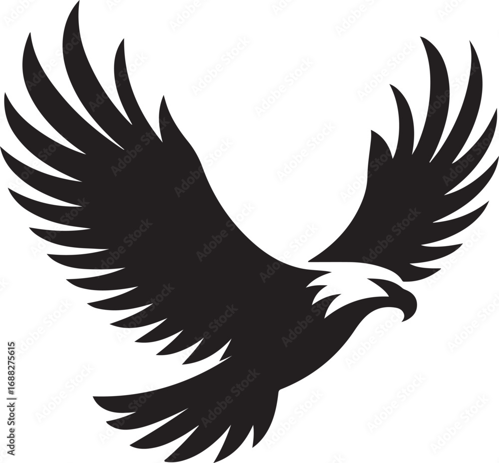 Obraz premium Majestic Silhouette of an Eagle with Wings Spread in Flight