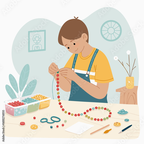 Creative Boy Engaged in Making Colorful Bead Jewelry.