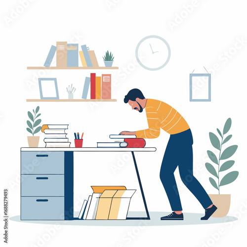 Focused young man researching information from books at his desk.