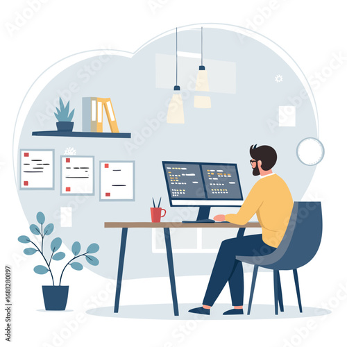 Male programmer focused on writing code at his modern workspace.