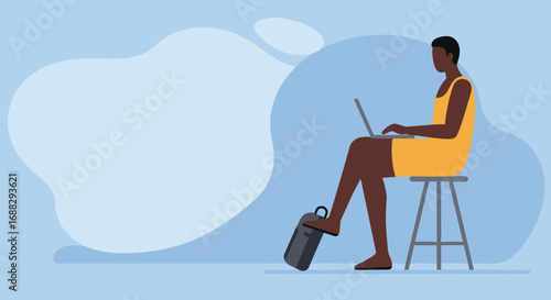 Focused individual in a yellow dress working remotely on a laptop with a travel bag. Illustrates flexible work, digital nomad lifestyle, and modern productivity.