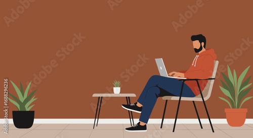 Casual man focused on his laptop in a minimalist home office setting with plants. Ideal for themes of remote work, freelancing, or online learning.