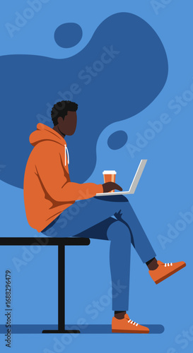 African American man in a hoodie works on a laptop with coffee, representing remote work, digital lifestyle, productivity, or online learning. Ideal for business, technology, and casual concepts.
