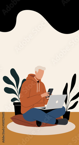 Man with grey hair works remotely from home using his laptop and smartphone, showcasing modern digital lifestyle and comfortable productivity.