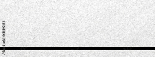 Plain white textured surface with a black horizontal line