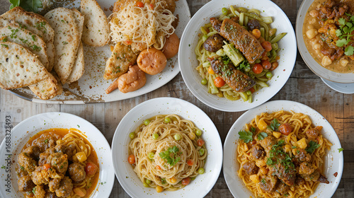 Variety of delicious home cooked meals served in white dishes