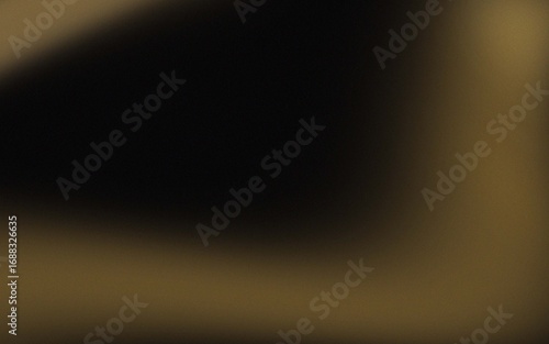Abstract blurred image with muted tones of gold and dark brown