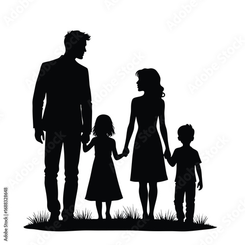 Black silhouette of a family holding hands on grass