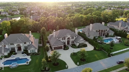 Luxury Homes Drone View of Upscale Neighborhood at Sunset