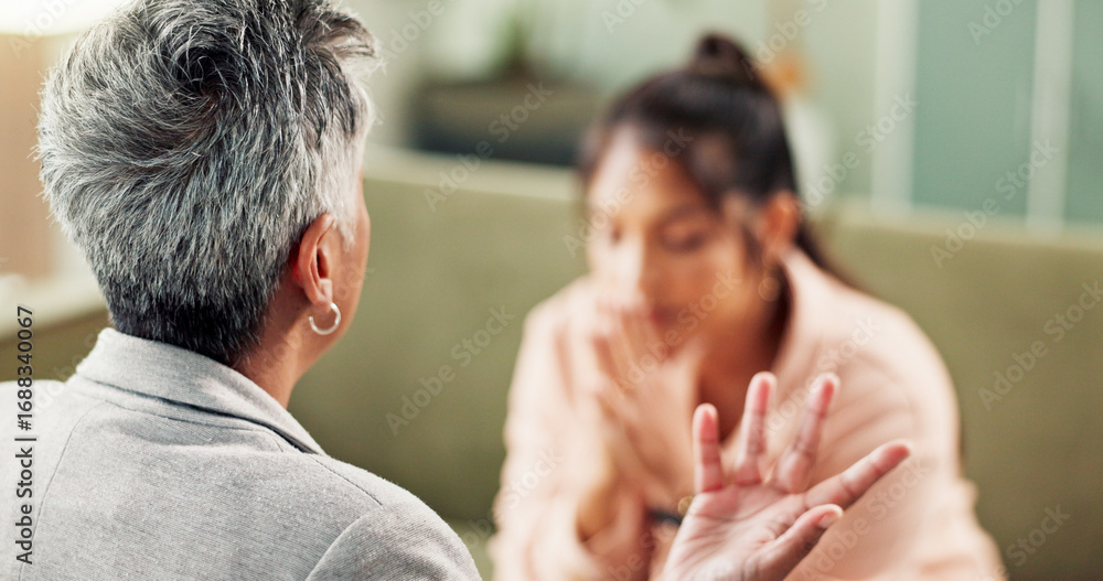 Fototapeta premium Psychologist, women and consultation with depression, sad and conversation with support. Stress, client and therapist with advice, mental health and back with ptsd, trauma counseling and anxiety