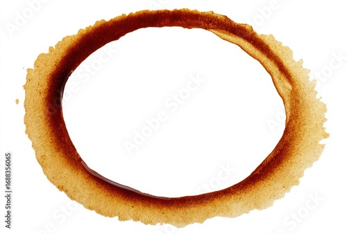Circular stain left by a drink on a white surface, with a darker brown rim and lighter brown fading outwards. The center is clean, creating a ring effect