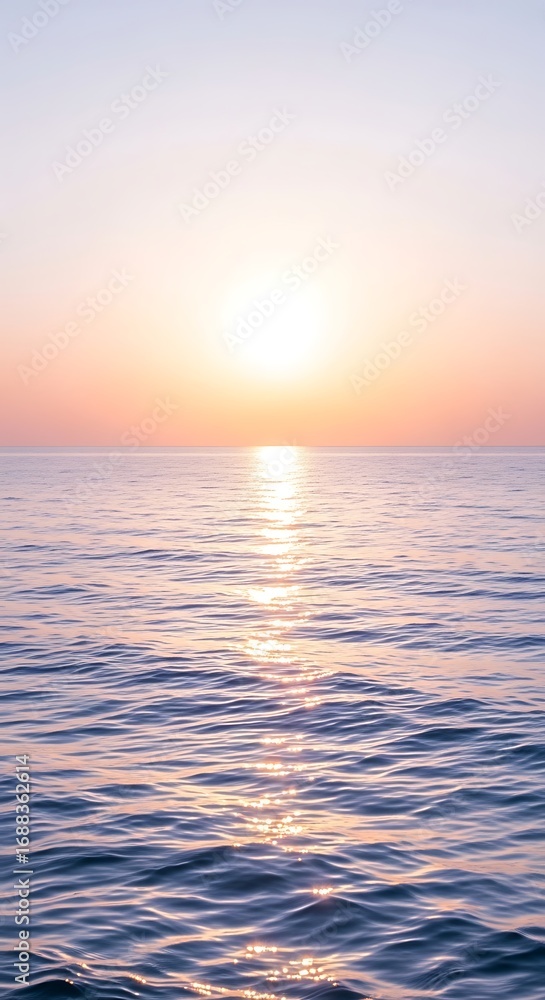Obraz premium Serene Ocean Sunset with Golden Sun Reflection on Gentle Waves water