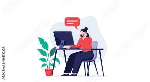 Woman working at a desk with a computer and plant