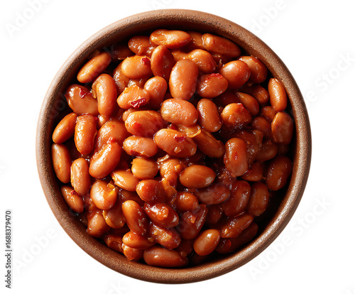 Top view of baked beans in a rustic bowl.
