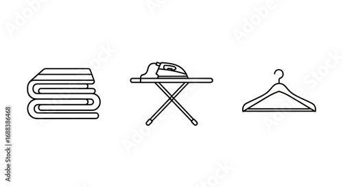 Laundry essentials: Folded towels, ironing board with iron, and a clothing hanger for clean garments