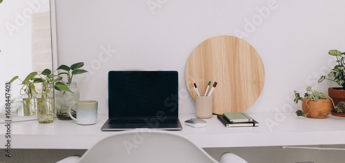 Canvastavla work from home laptop and desk setup of environment for student aspirant employe