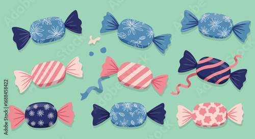 Colorful wrapped candies with floral and striped patterns on green background