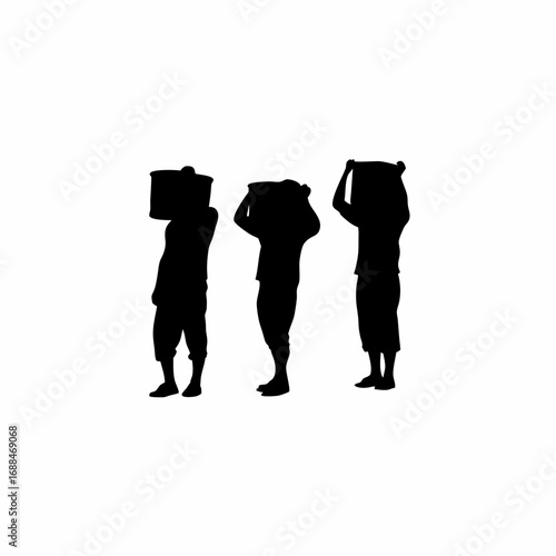 Silhouette of grape harvesters in a line carrying crates