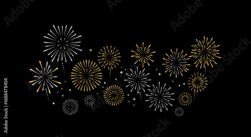 Festive fireworks in gold and silver on black background