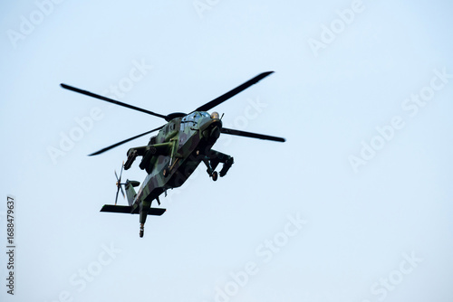 Wallpaper Mural Helicopter is flying over isolated blue sky  Torontodigital.ca